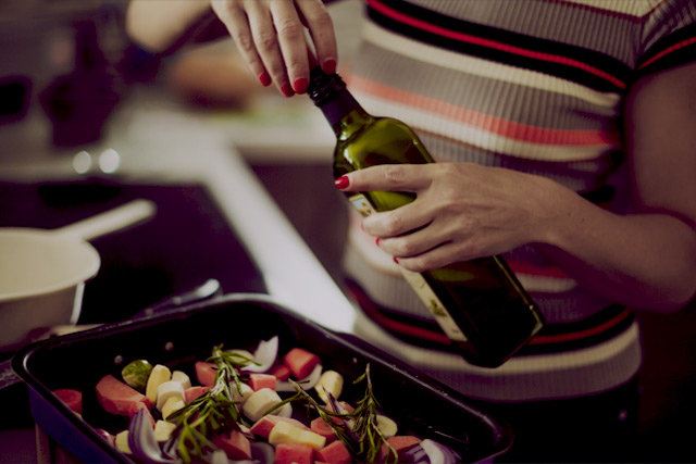 A home cook cooking with wine sourced from her corner pantry